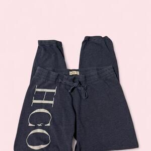 Hollister navy sweatpants with white logo Size Medium